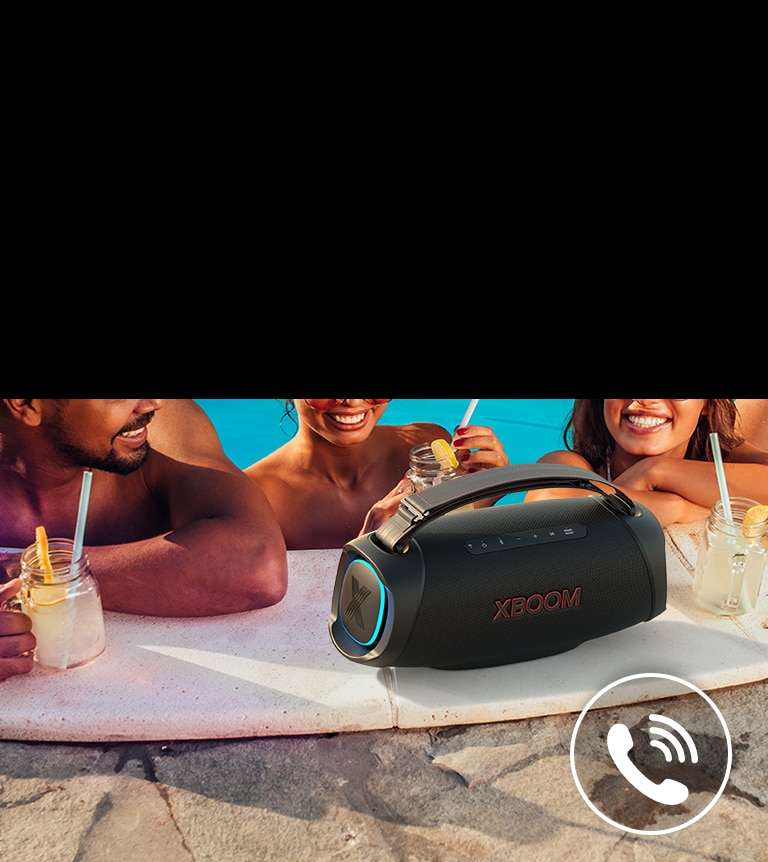LG XBOOM Go XG8T is placed on the poolside. Three people are talking through the speaker in the pool.