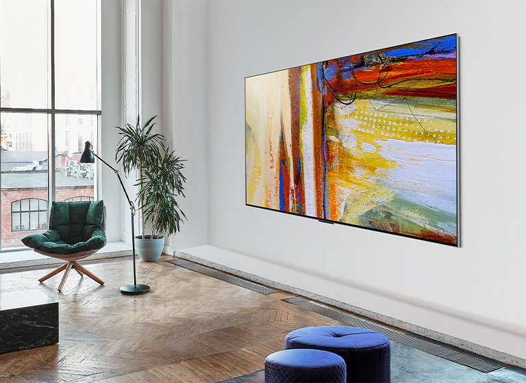 An image of LG OLED G3 showing a colourful abstract artwork in a bright and vivid room.