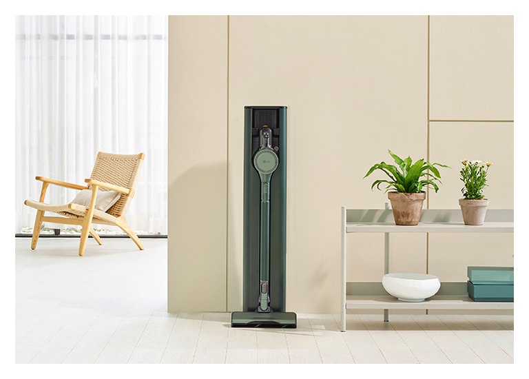 It shows nature green color LG Objet Collection A9T-Steam is placed in a modern living room.