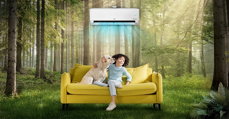 Children and pets are happy sitting on the couch in the forest, enjoying the air conditioning wind like natural wind.