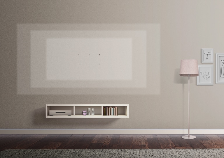 Jelölések, amelyek leírják a nappali falán lévő, ultranagy képernyős TV-k különböző méreteit; a berendezés között egy rózsaszín állvány, keretek és egy TV-szekrény is látható.