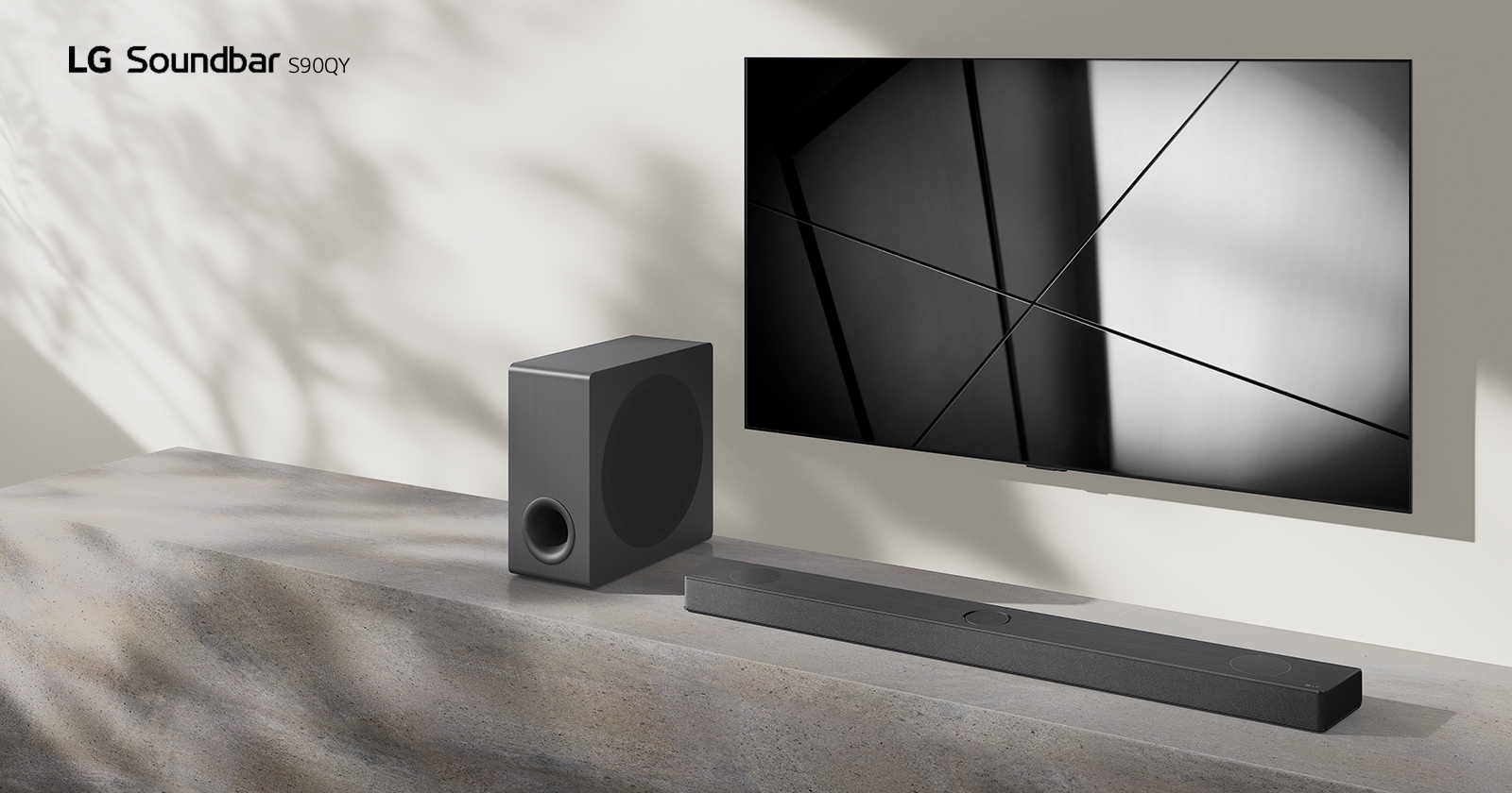 LG sound bar S90QY and LG TV are placed together in the living room. The TV is on, displaying a black and white image.