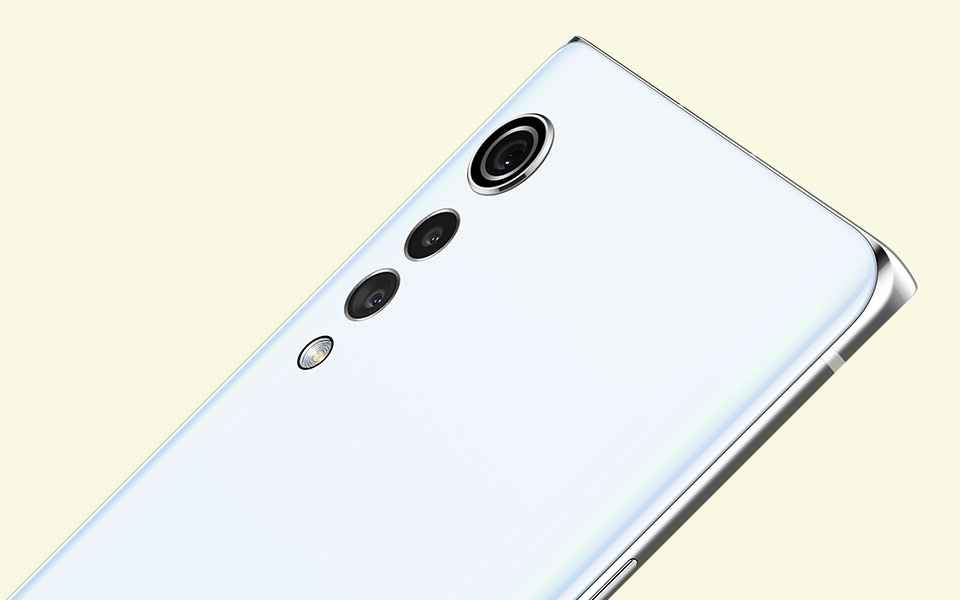 A rear view of the LG VELVET smartphone in Aurora White colour