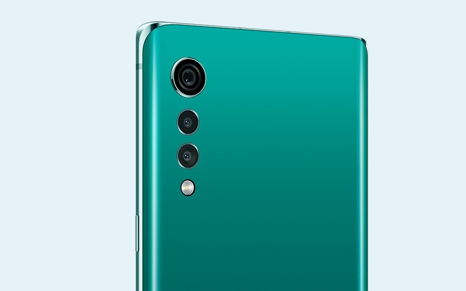 A rear view of the LG VELVET smartphone in Aurora Green colour