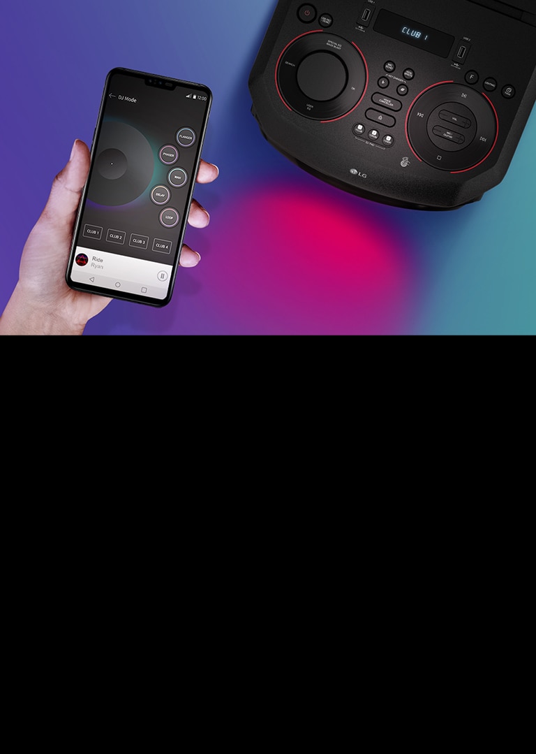 A hand holding a smartphone next to a top view of LG XBOOM.